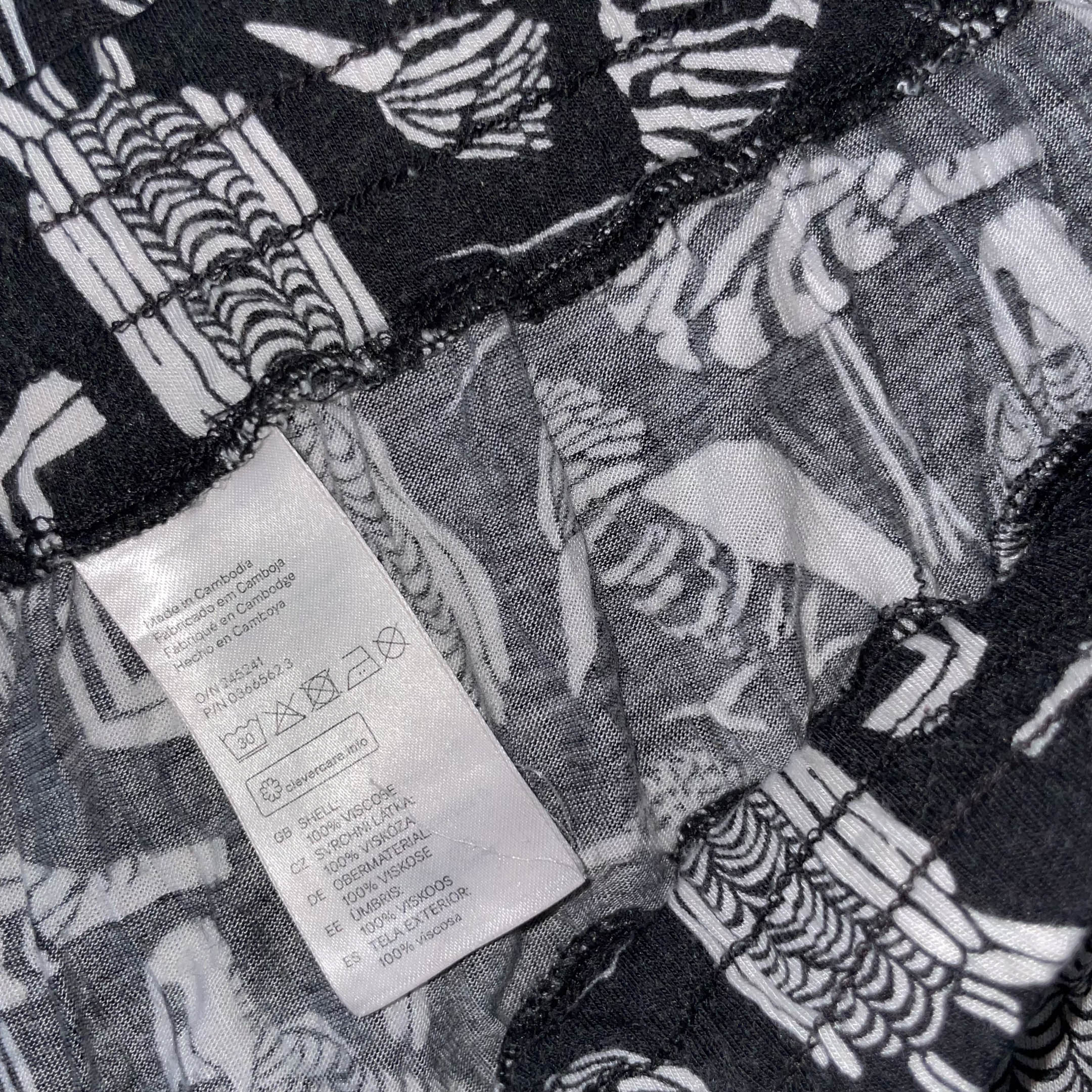 Vintage Black Animal print women's straight leg trouser| SKU 3677| L 37 W 30