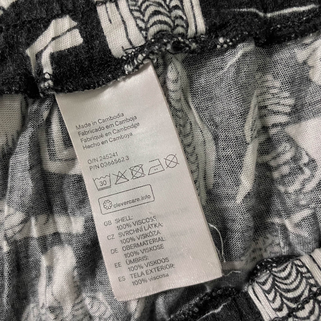 Vintage Black Animal print women's straight leg trouser| SKU 3677| L 37 W 30