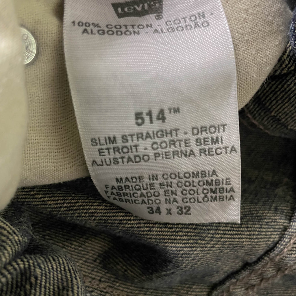 Vintage Levis 34 x 32 514 Slim Straight Medium Distressed blue Denim Jeans| 3731