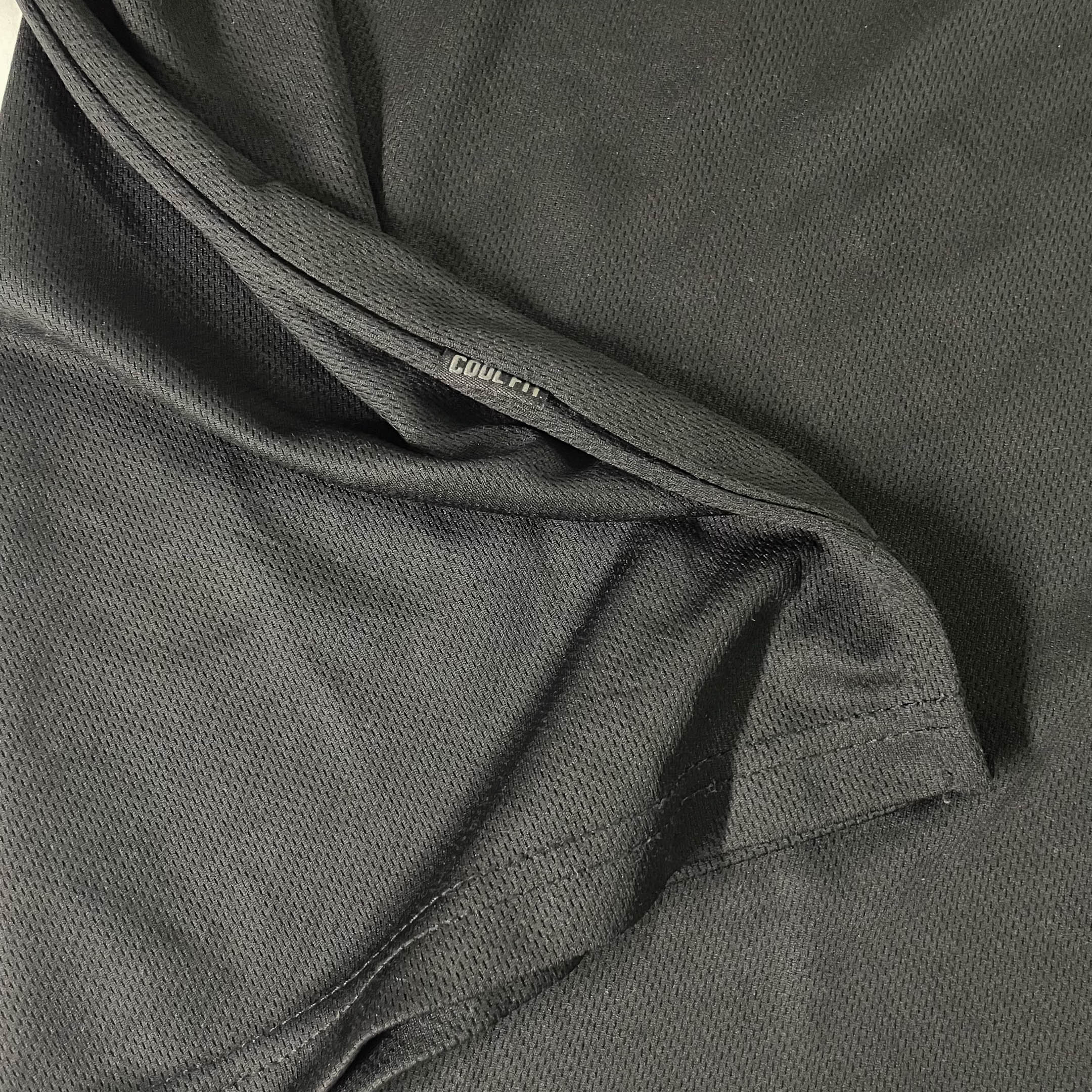 Vintage mens black regular fit polo shirt with sun flower crest at the back in L