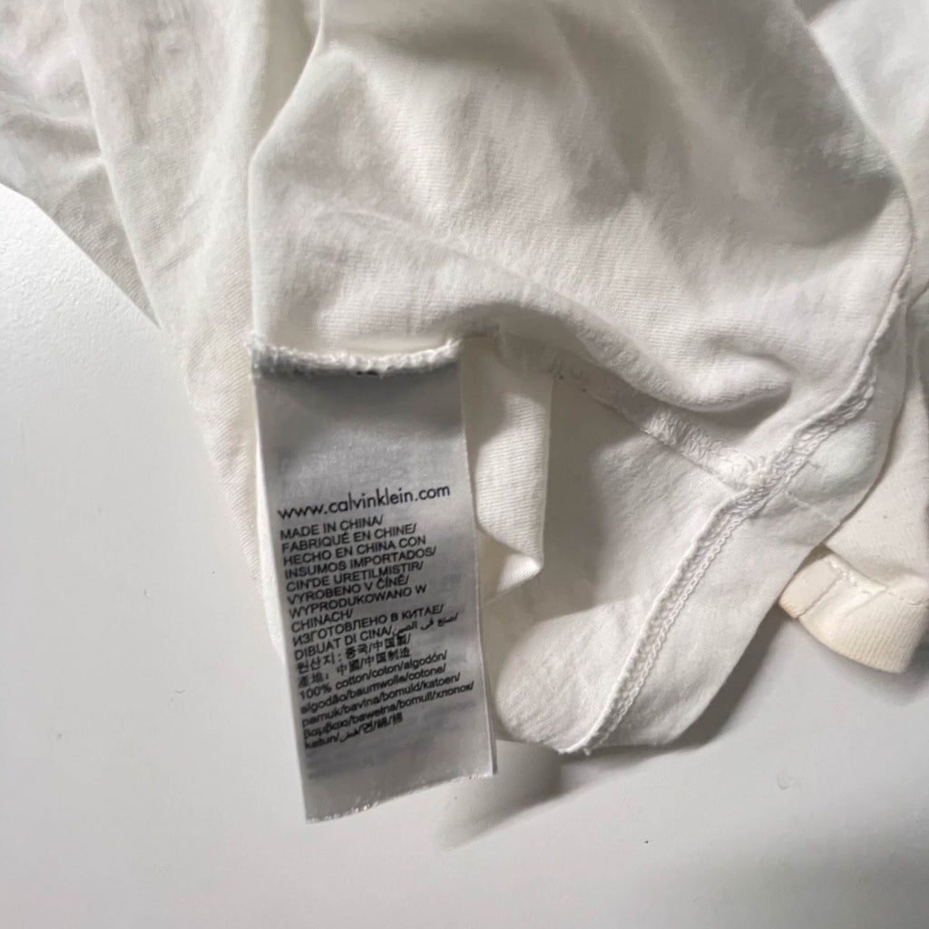 Vintage Women's Calvin Klein jeans graphics large white tees