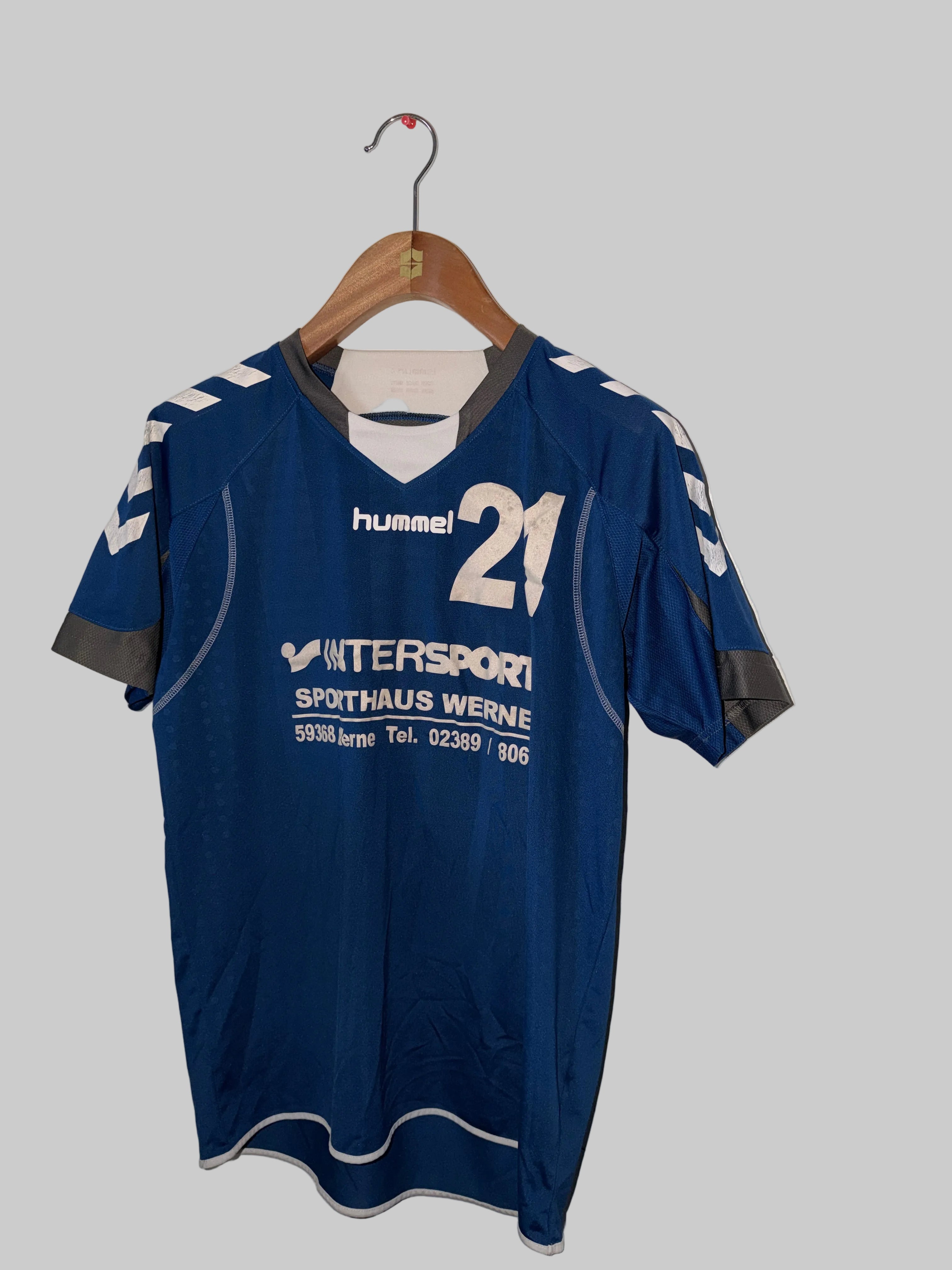 VINTAGE blue Hummel handball jersey with the number 21 and sponsor text for Intersport Sporthaus Werne.  Size M SKU7350