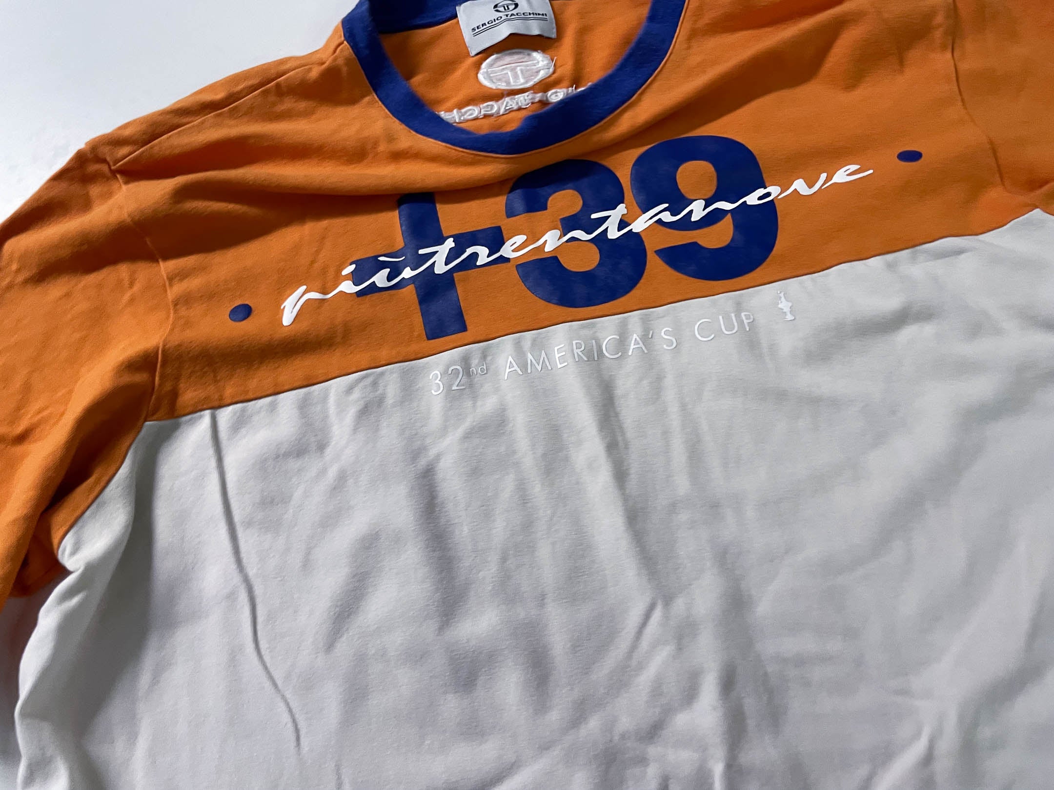 Vintage Men's Sergio Tacchini colorblock orange & white tees in L|L27 W18|SKU 4116