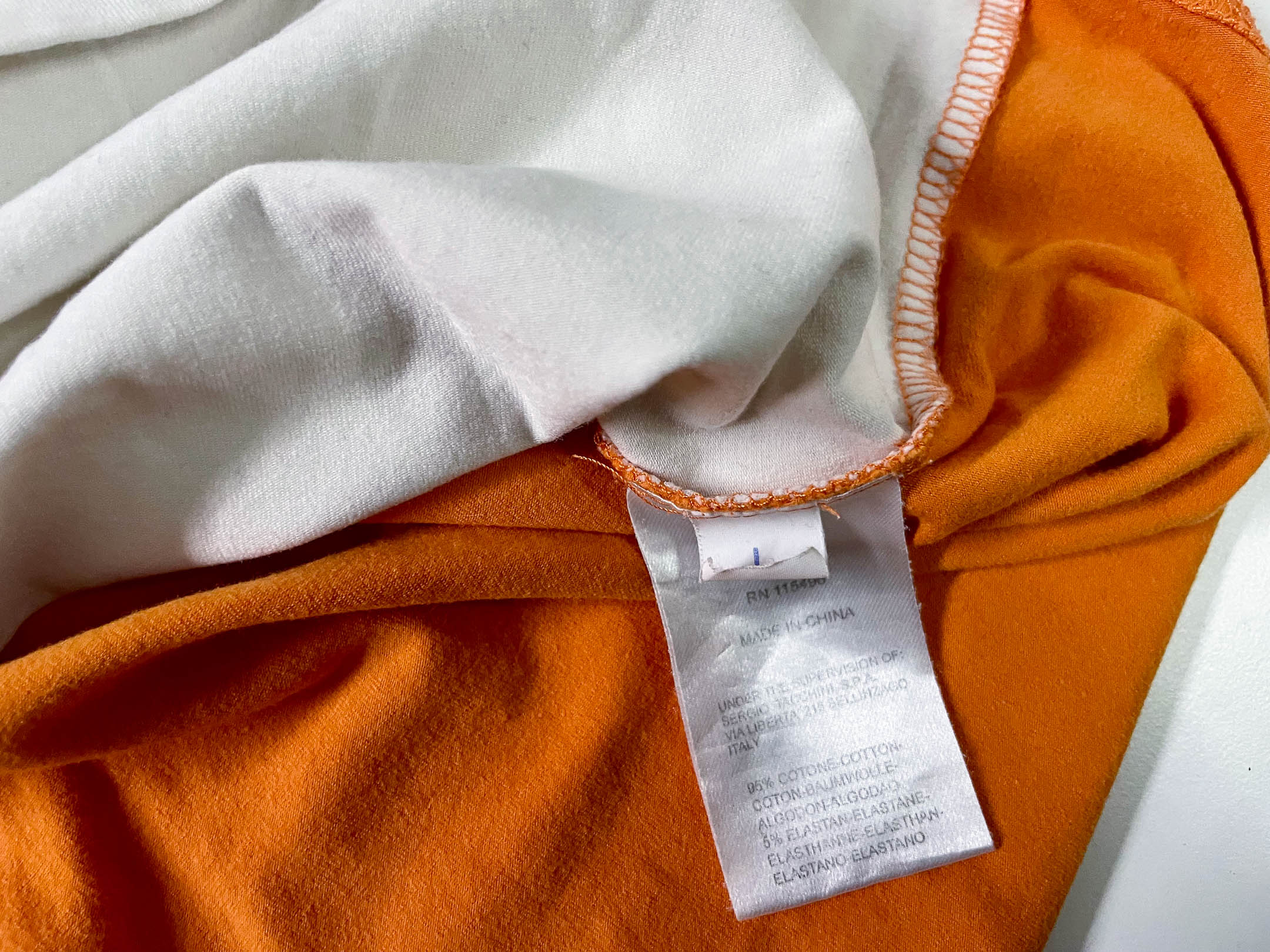 Vintage Men's Sergio Tacchini colorblock orange & white tees in L|L27 W18|SKU 4116