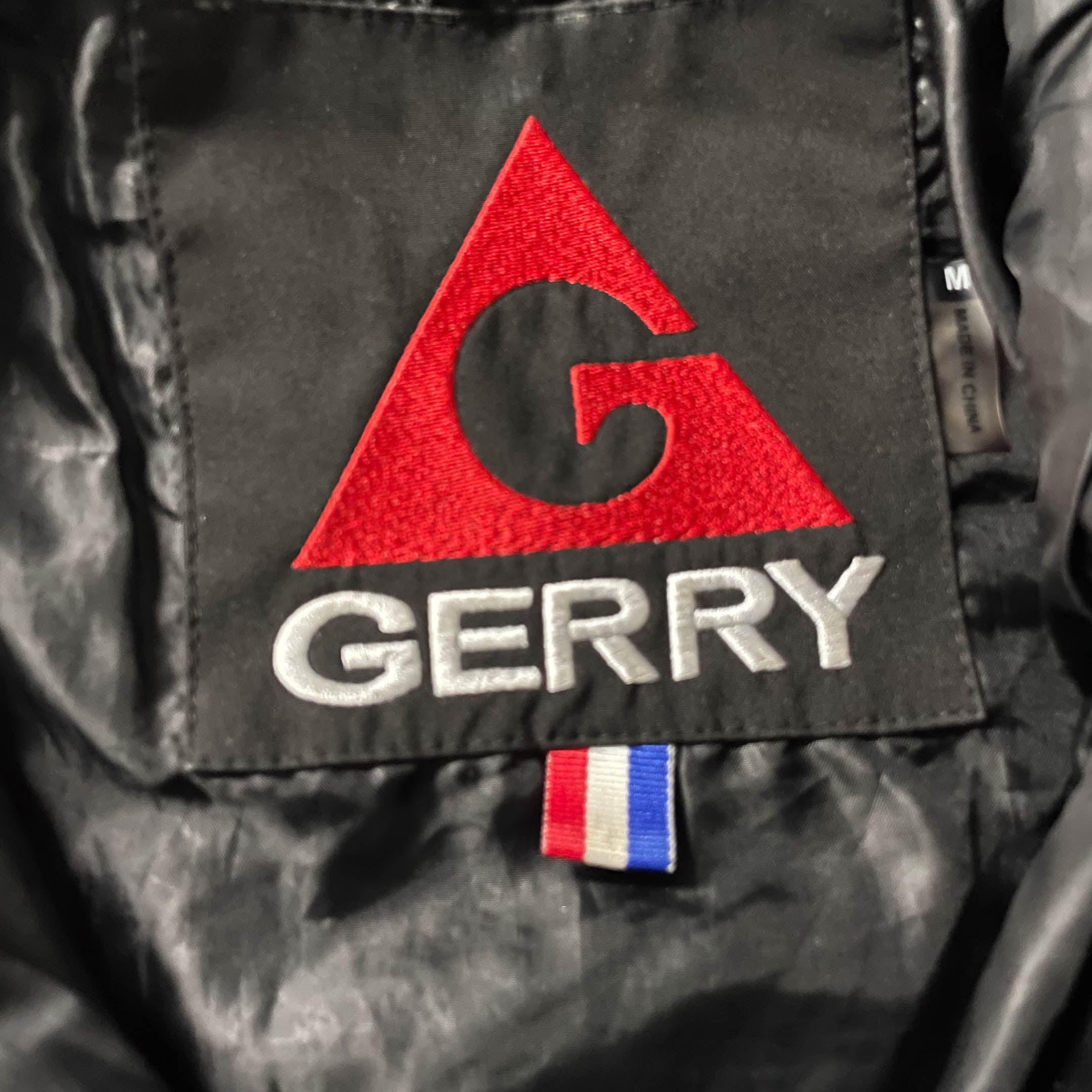 Vintage Gerry men's black polyester padded jacket in M|L30 W22|Made in China