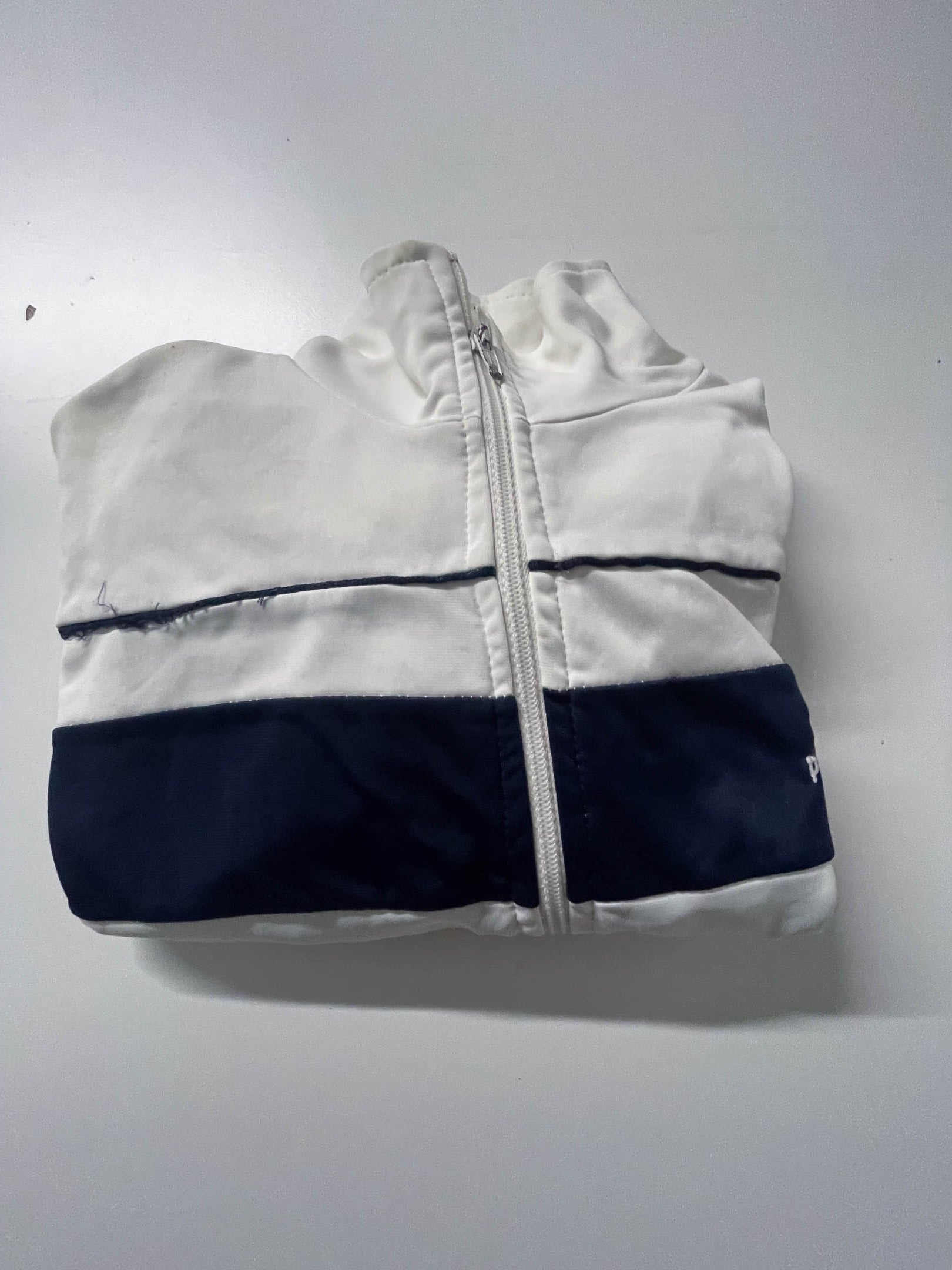 Vintage Women's white Puma full zip high neck track top in M|L28 W21|SKU 3890
