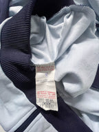 Vintage Puma Blue men's full zip high neck polyester track top in M|L31W23|SKU 3896