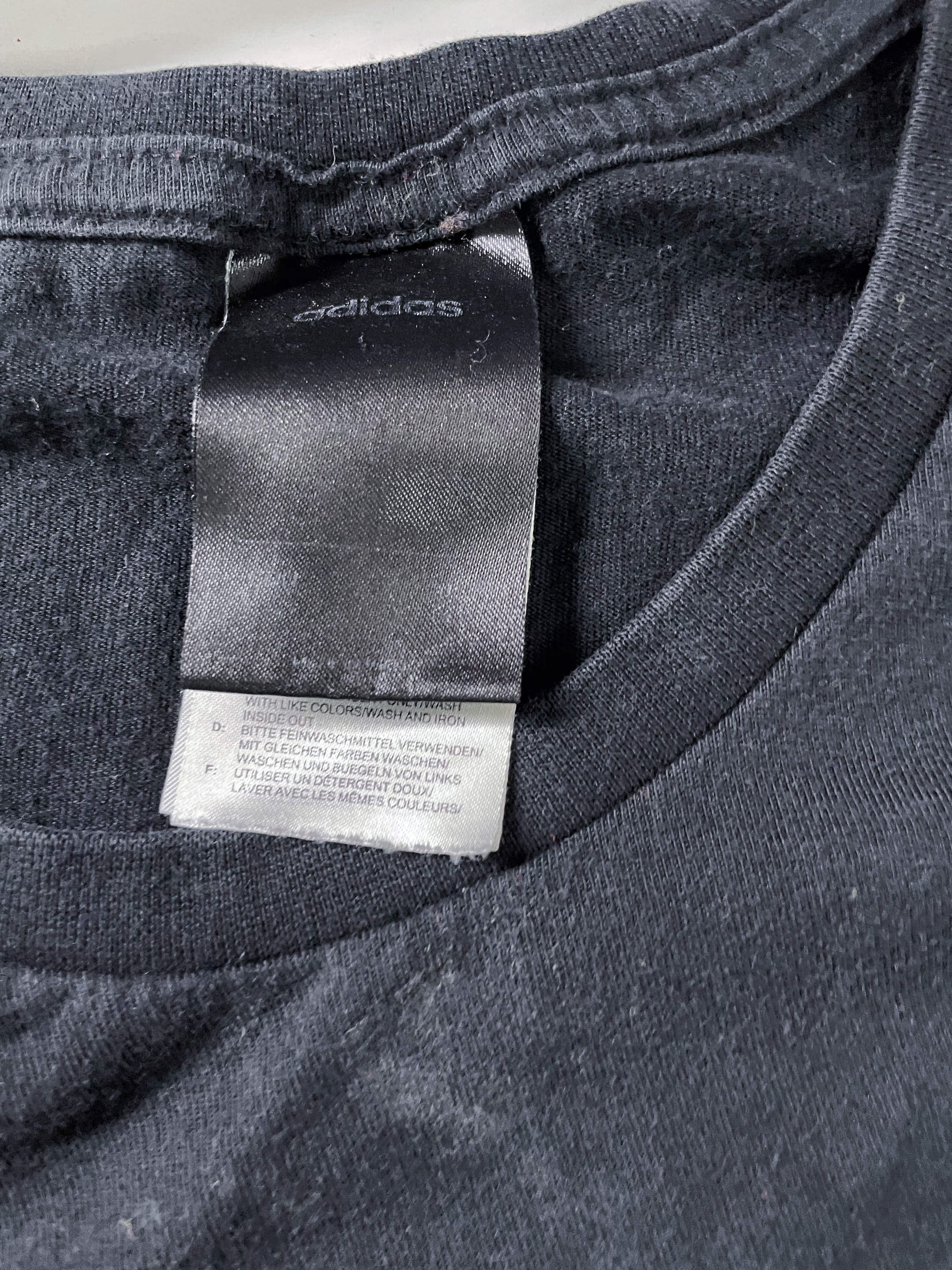 Vintage Men's Black Adidas 03 graphics short sleeve tees in XXL|L31 W22|SKU 4131