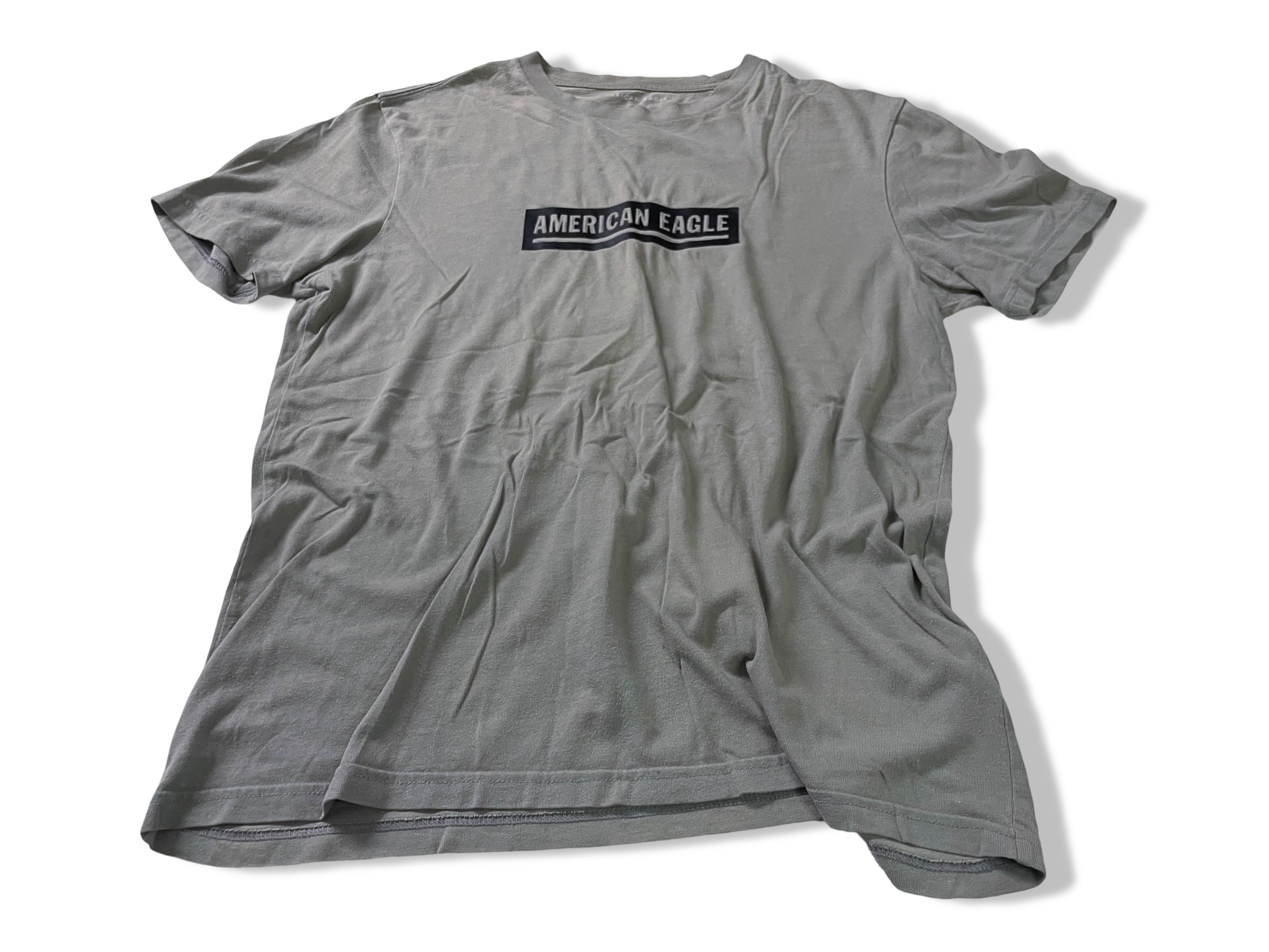 Vintage Men's American Eagle Cream standard fit tees in M|L27 W19|SKU 4132