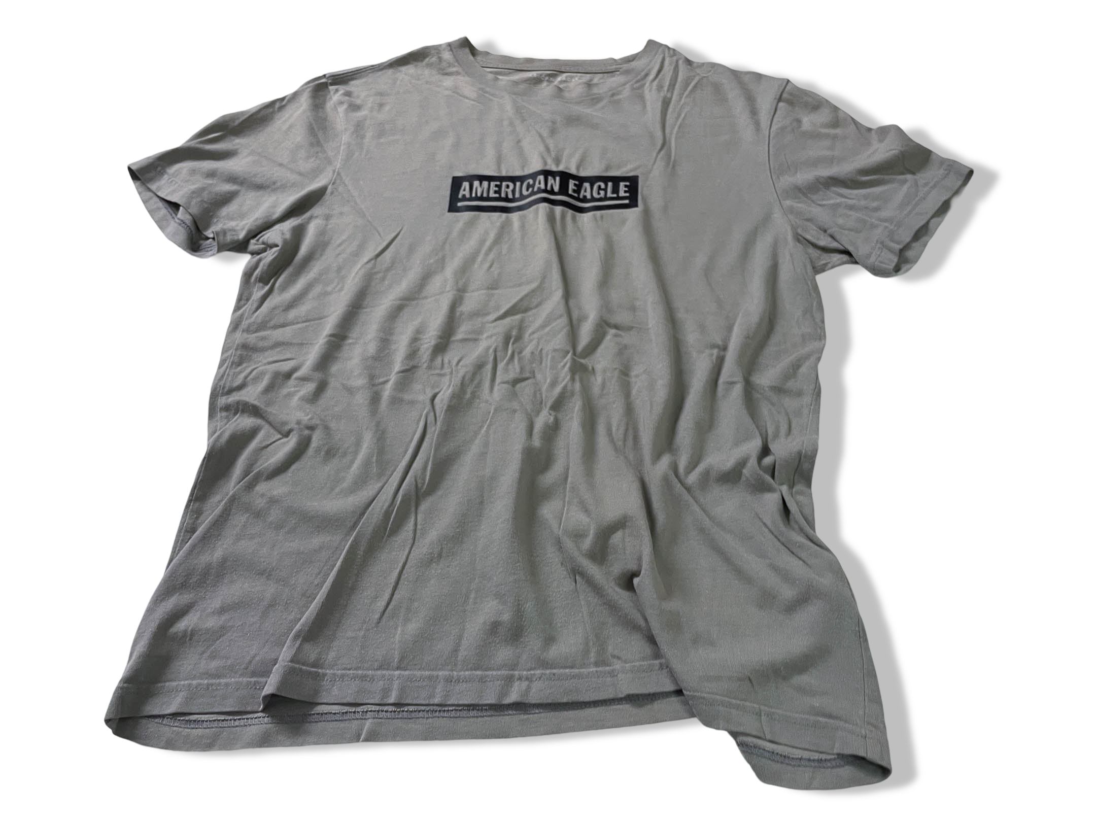 Vintage Men's American Eagle Cream standard fit tees in M|L27 W19|SKU 4132