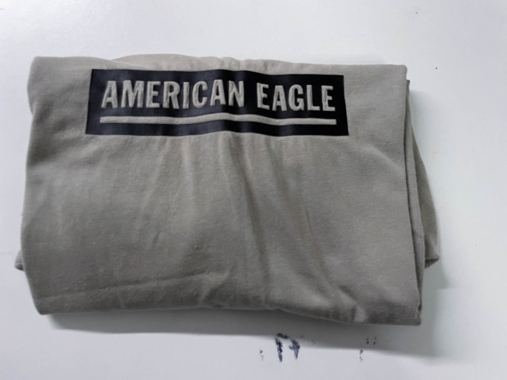Vintage Men's American Eagle Cream standard fit tees in M|L27 W19|SKU 4132