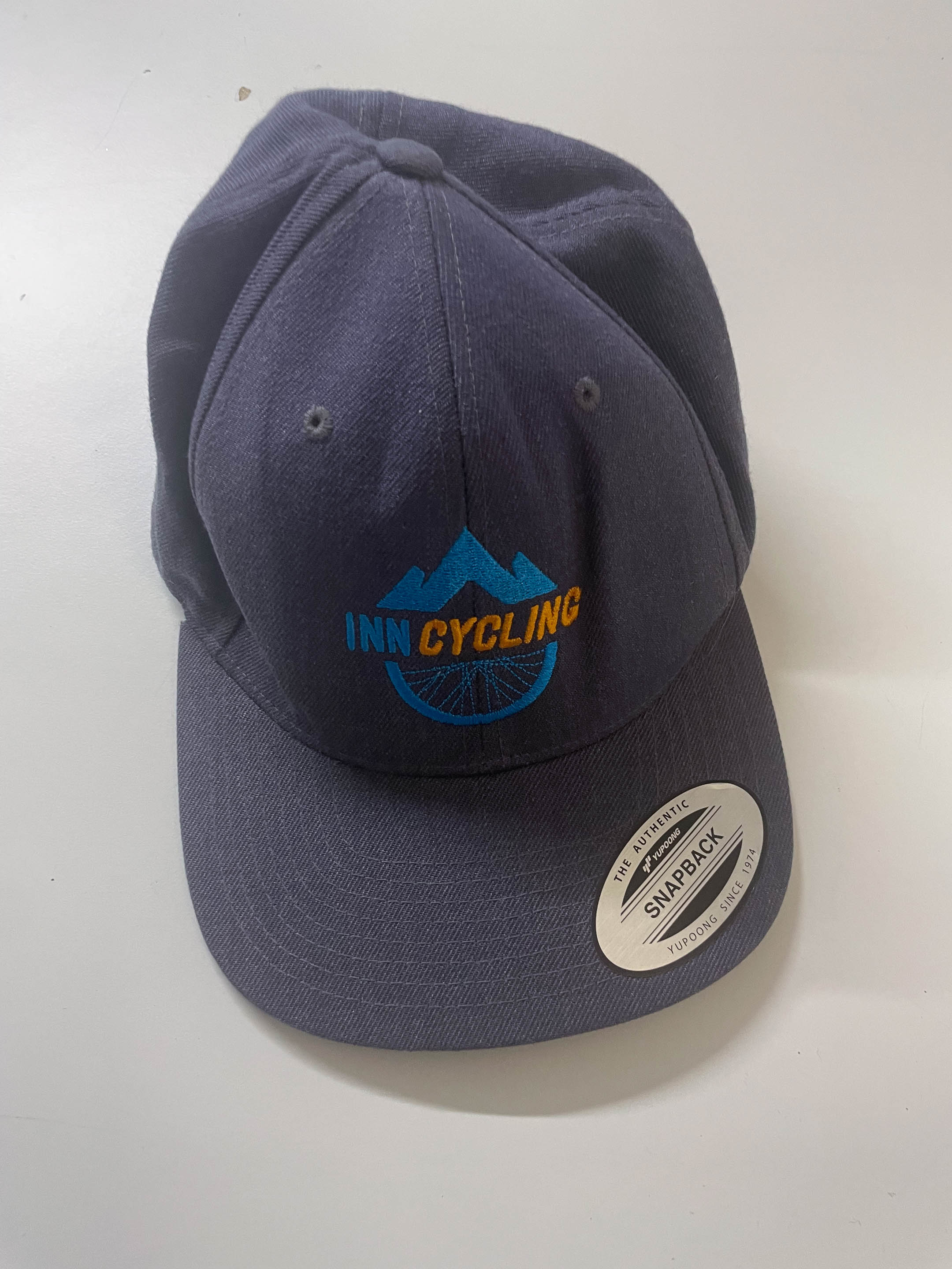 Vintage blue classic Yupoong retro snap cap with Inn cycling print| One size