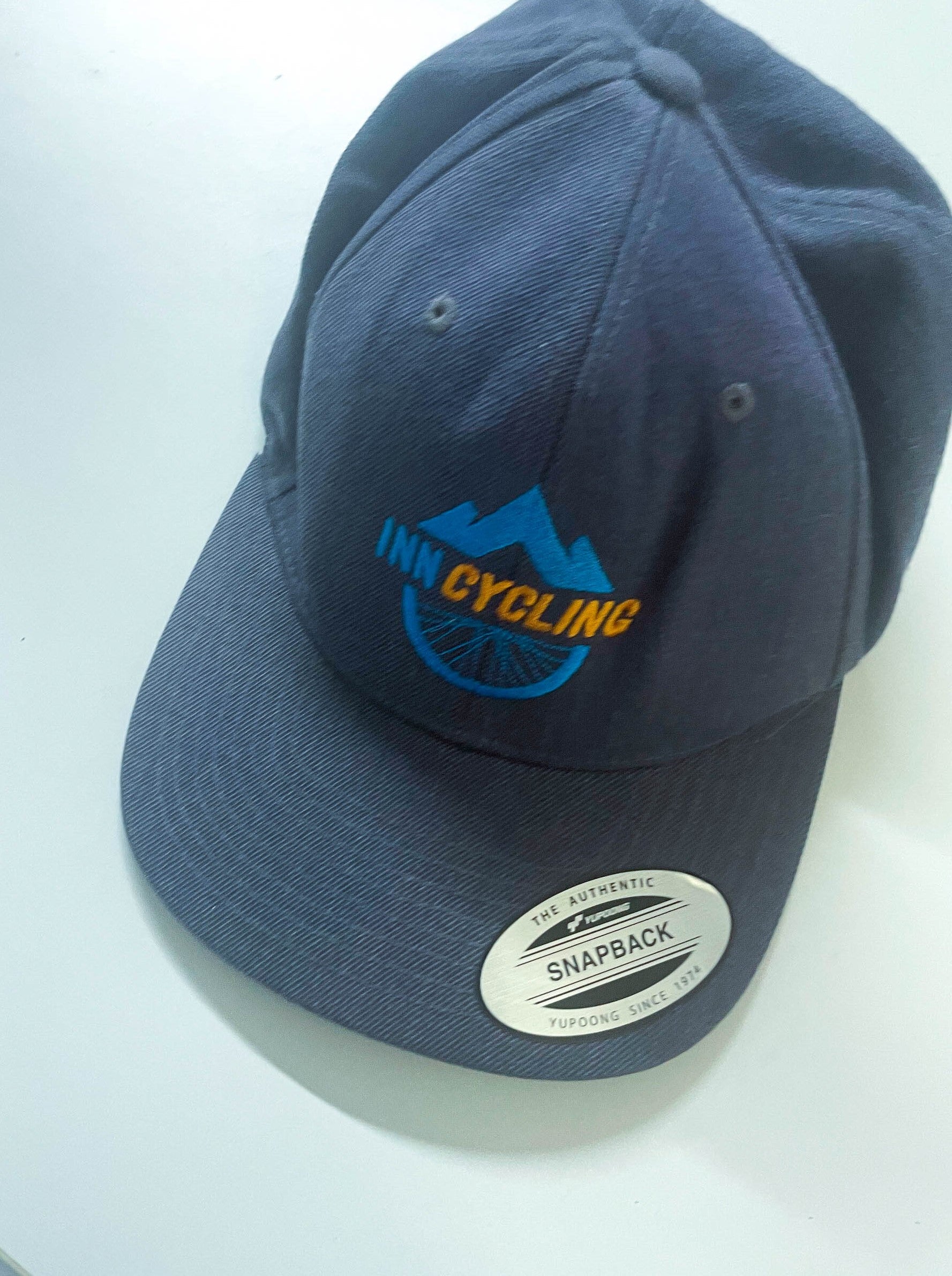 Vintage blue classic Yupoong retro snap cap with Inn cycling print| One size