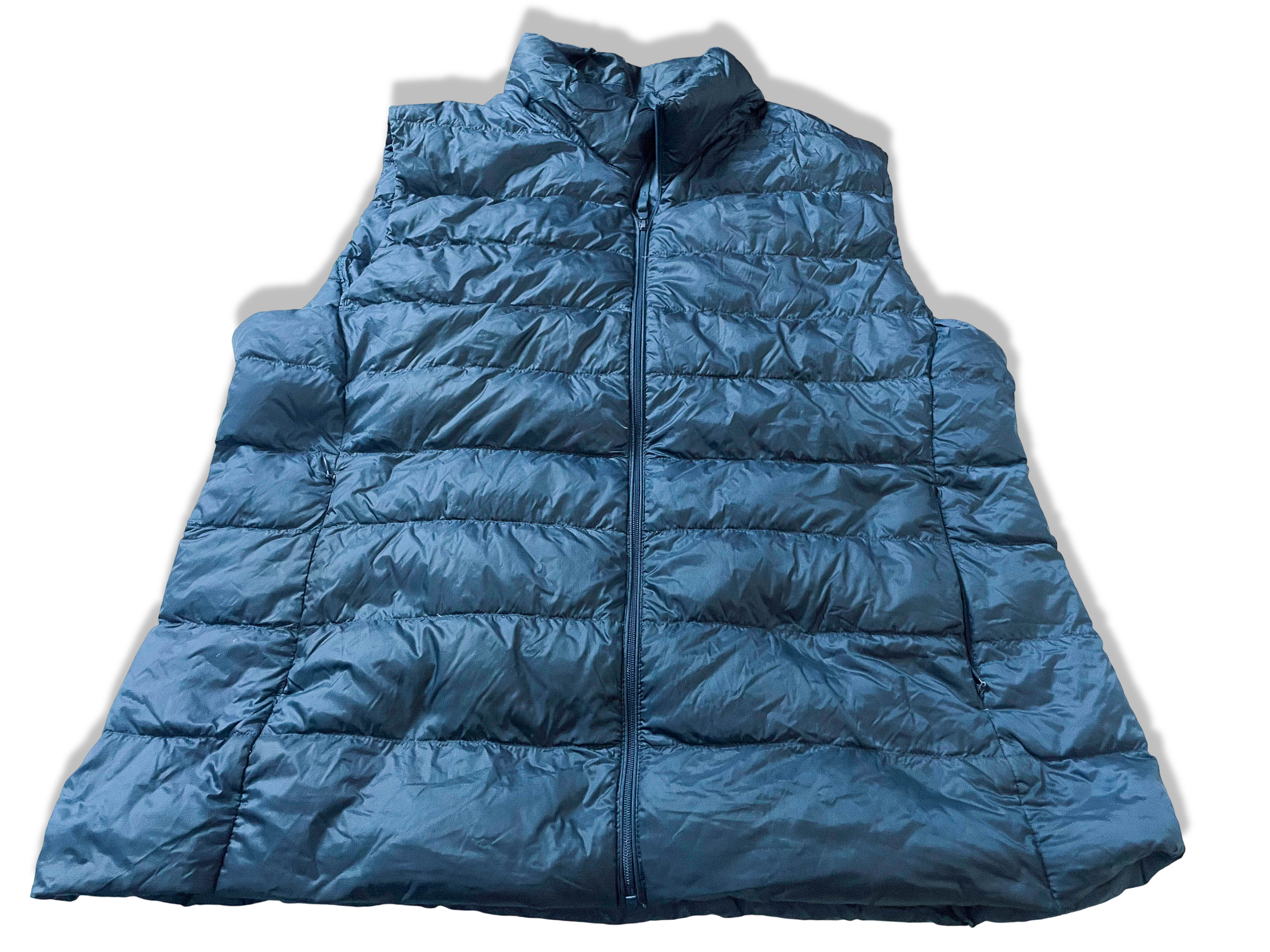 Vintage Women's Uniqlo Navy sleeveless full zip puffer padded jacket in XL|L27 W20|SKU 3971