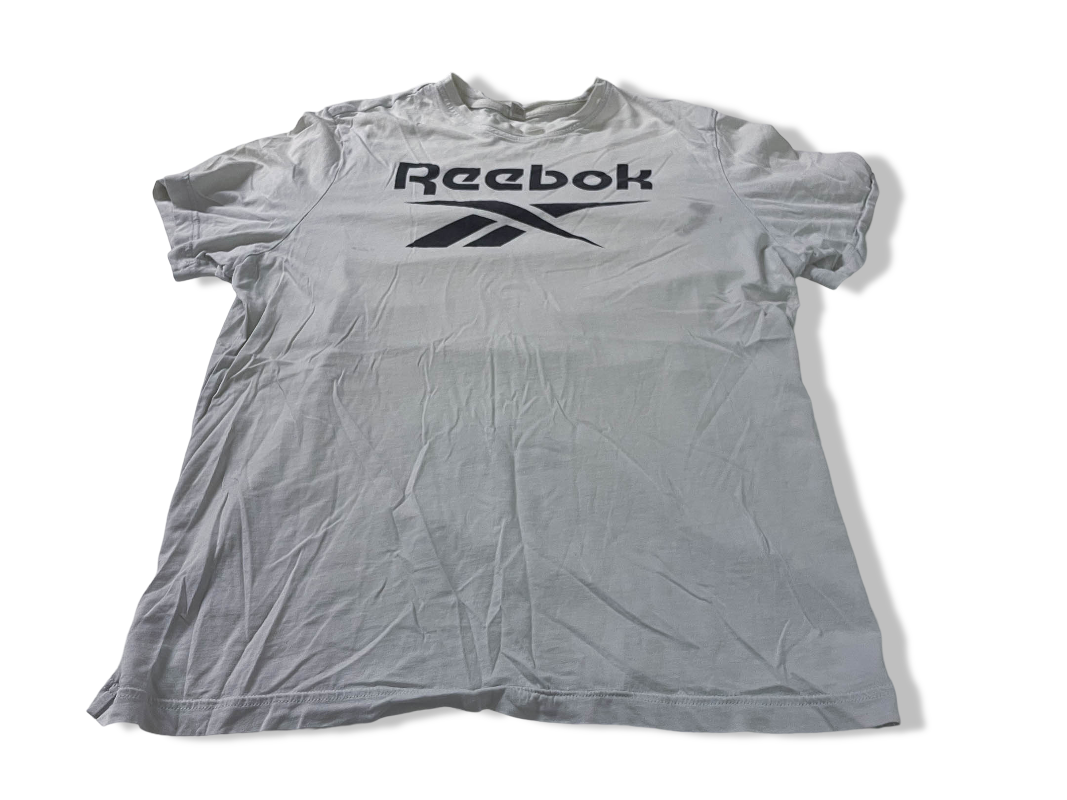 Vintage Men's Reebok print white short sleeve tees in M|L28 W20| SKU 4138