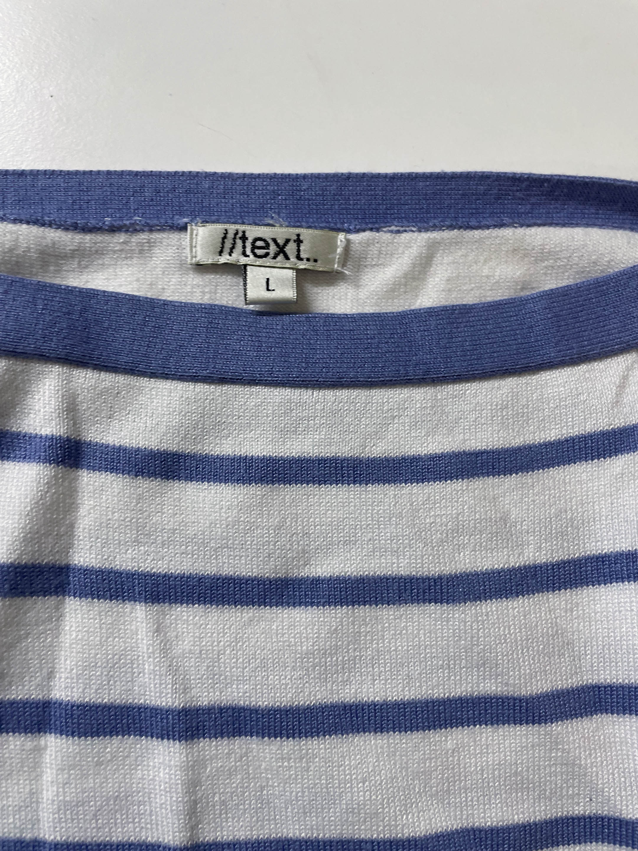 Women's y2k //text.. blue & white stripe top in L| L23 W20| SKU 3982