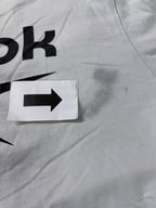 Vintage Men's Reebok print white short sleeve tees in M|L28 W20| SKU 4138