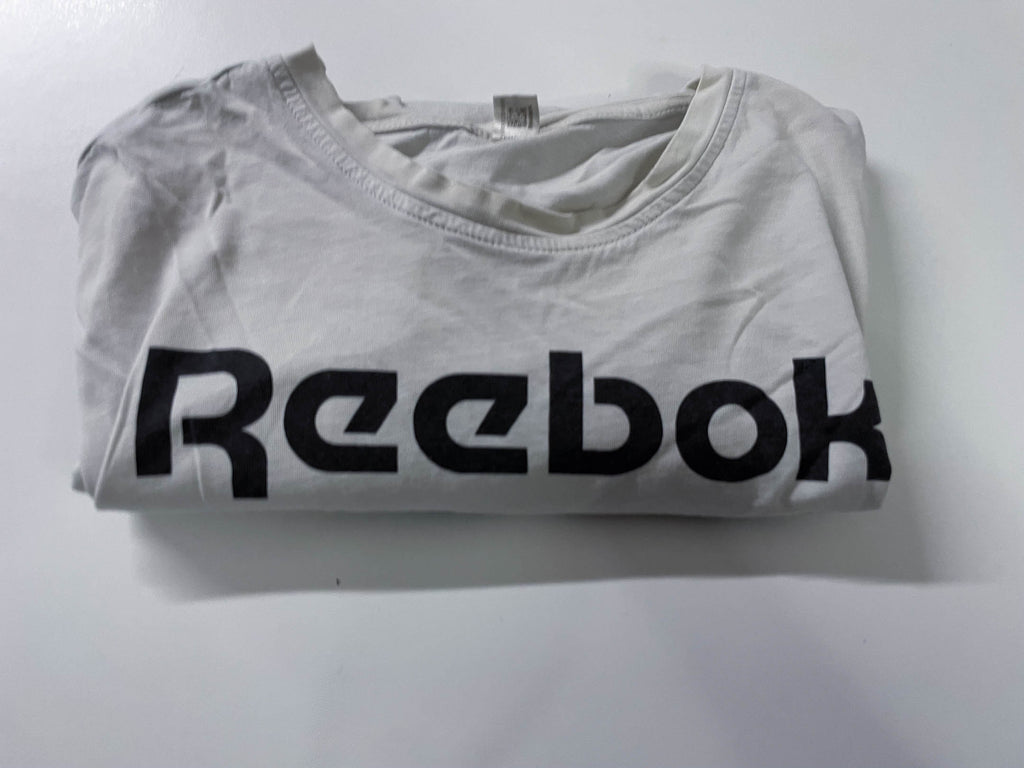 Vintage Men's Reebok print white short sleeve tees in M|L28 W20| SKU 4138