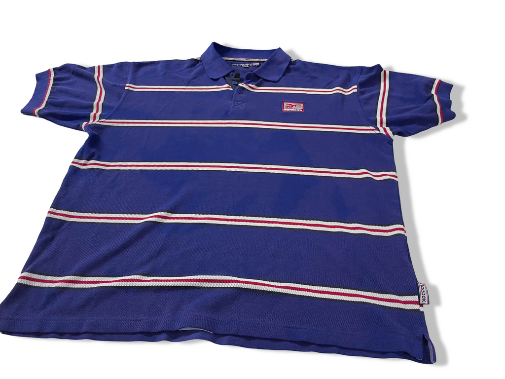 Vintage Men's Reebok Athletics Dept. Blue stripe polo shirt in M|L28 W20|SKU 4140