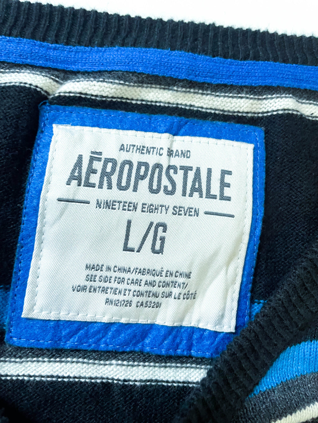 Vintage Men's 90's Aeropostale blue multi stripe sweatshirt in L|L28 W21|SKU 3991