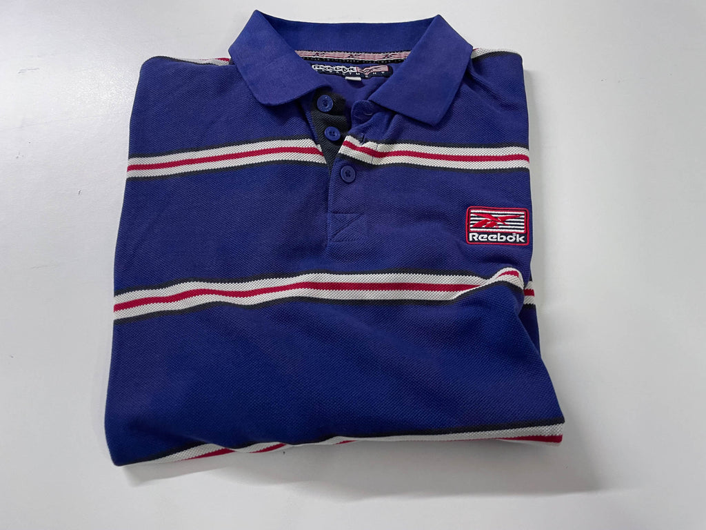 Vintage Men's Reebok Athletics Dept. Blue stripe polo shirt in M|L28 W20|SKU 4140