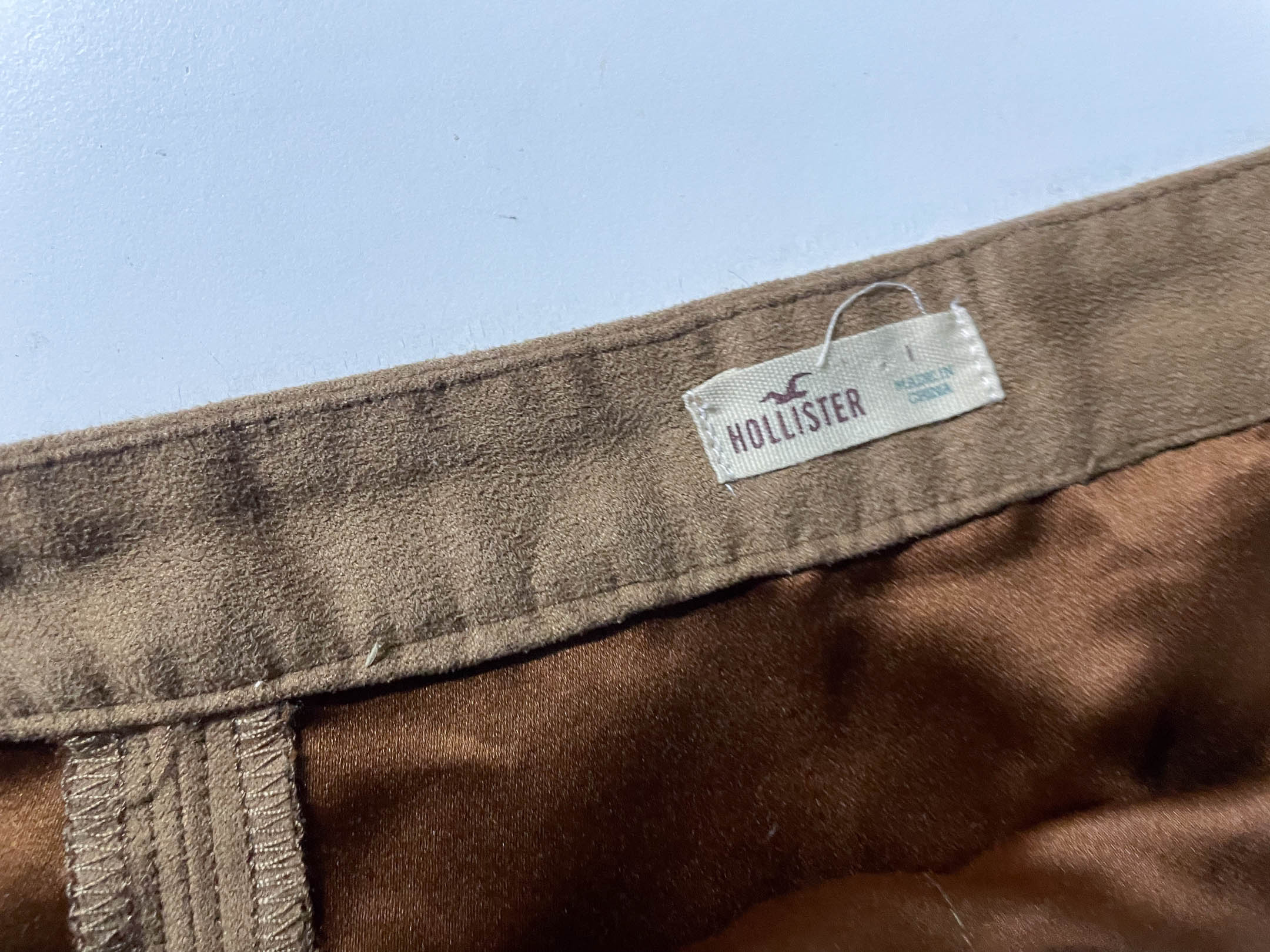 Vintage Women's Hollister Suede Tan Mini skirt in XS/S Made in China|L16 W26|SKU 4036