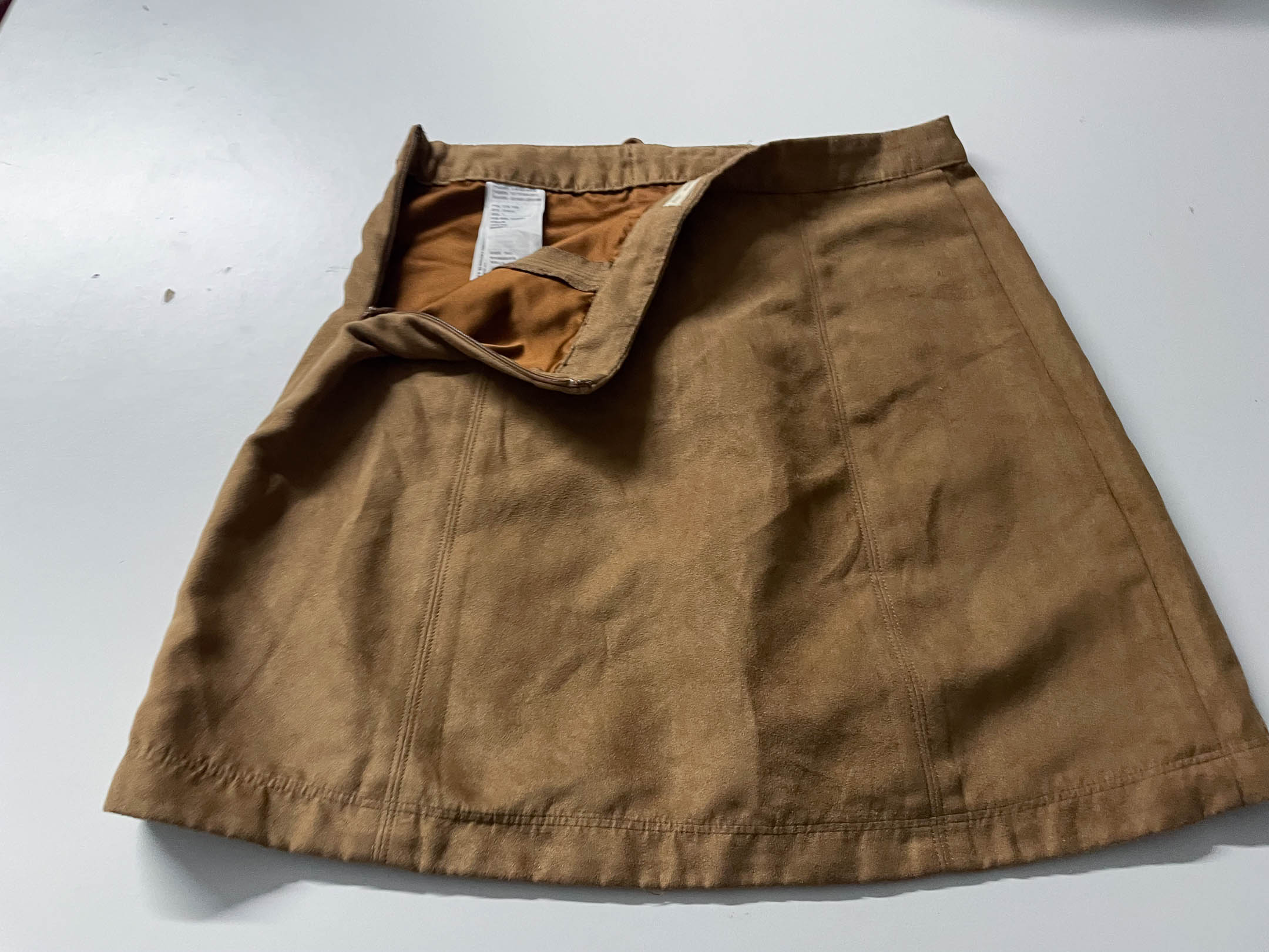 Vintage Women's Hollister Suede Tan Mini skirt in XS/S Made in China|L16 W26|SKU 4036