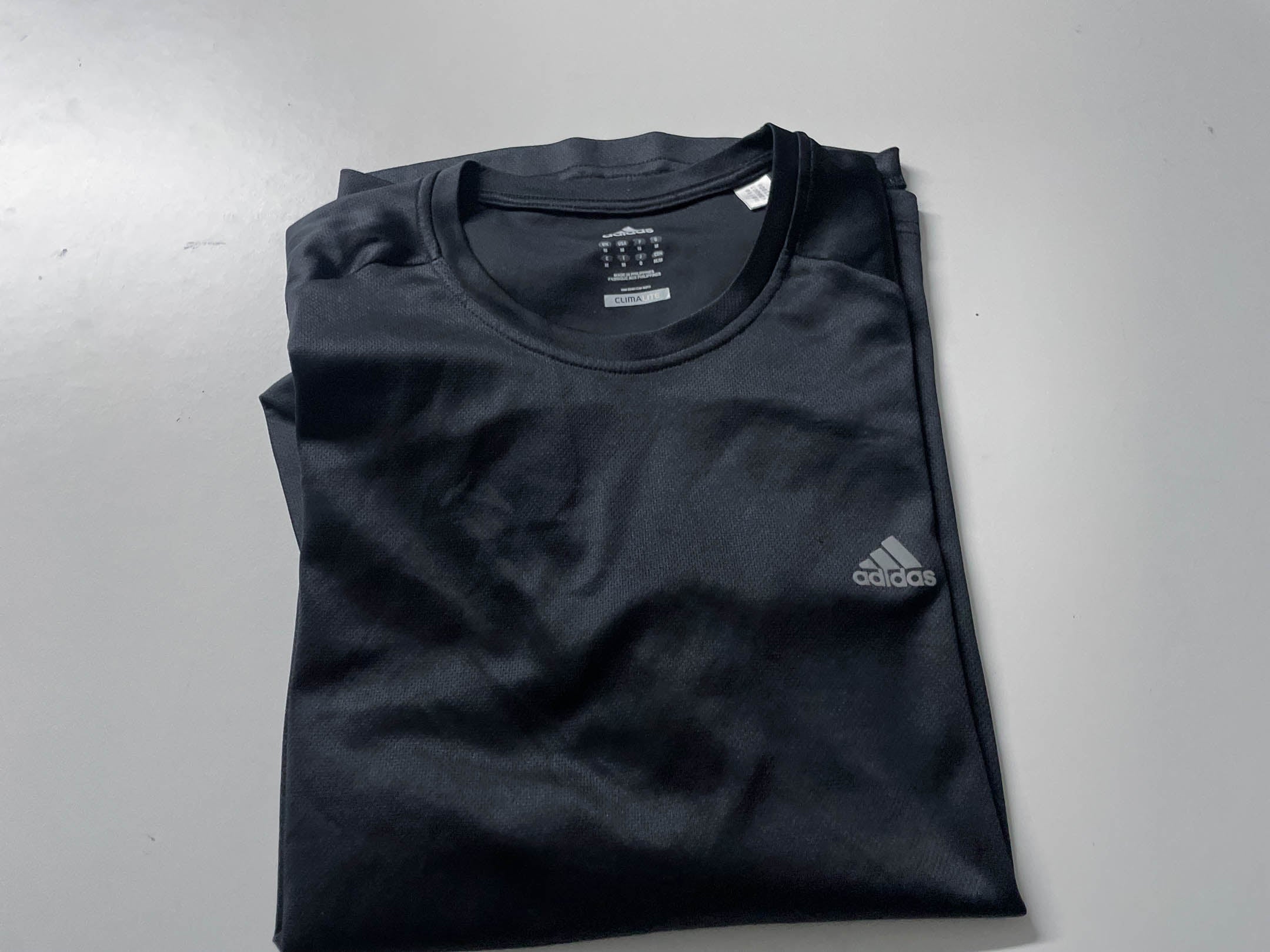 Vintage Men's Black Adidas Climalite training short sleeve tees in M Made in Philippines|L18 W20| SKU 4048
