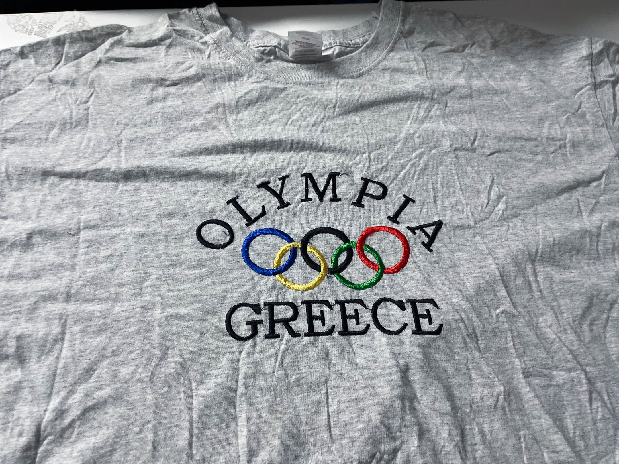 Vintage Men's Grey Fruit of the loom Olympia Greece logo Graphics tees in XL|L28W23|SKU 4054