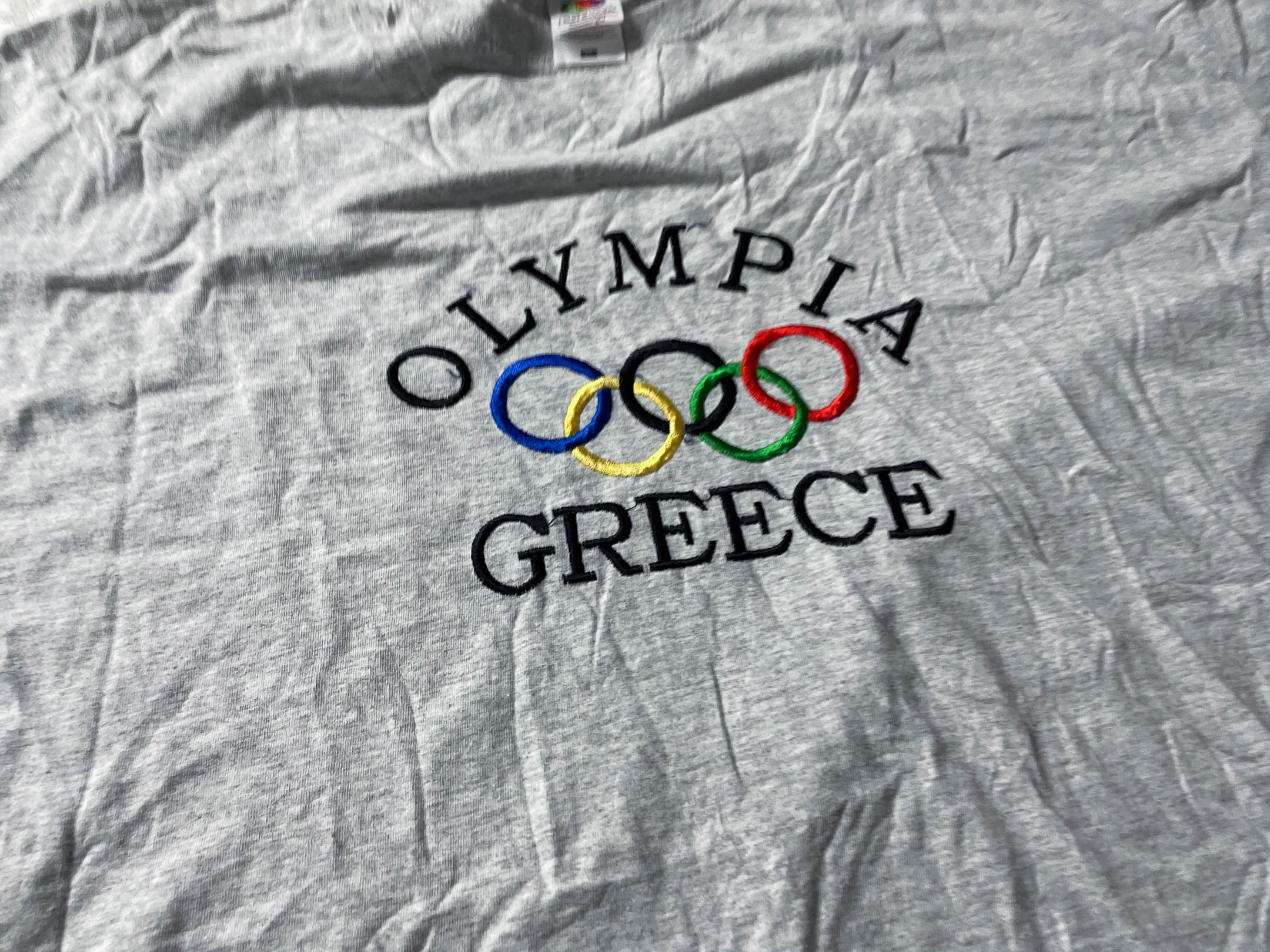 Vintage Men's Grey Fruit of the loom Olympia Greece logo Graphics tees in XL|L28W23|SKU 4054