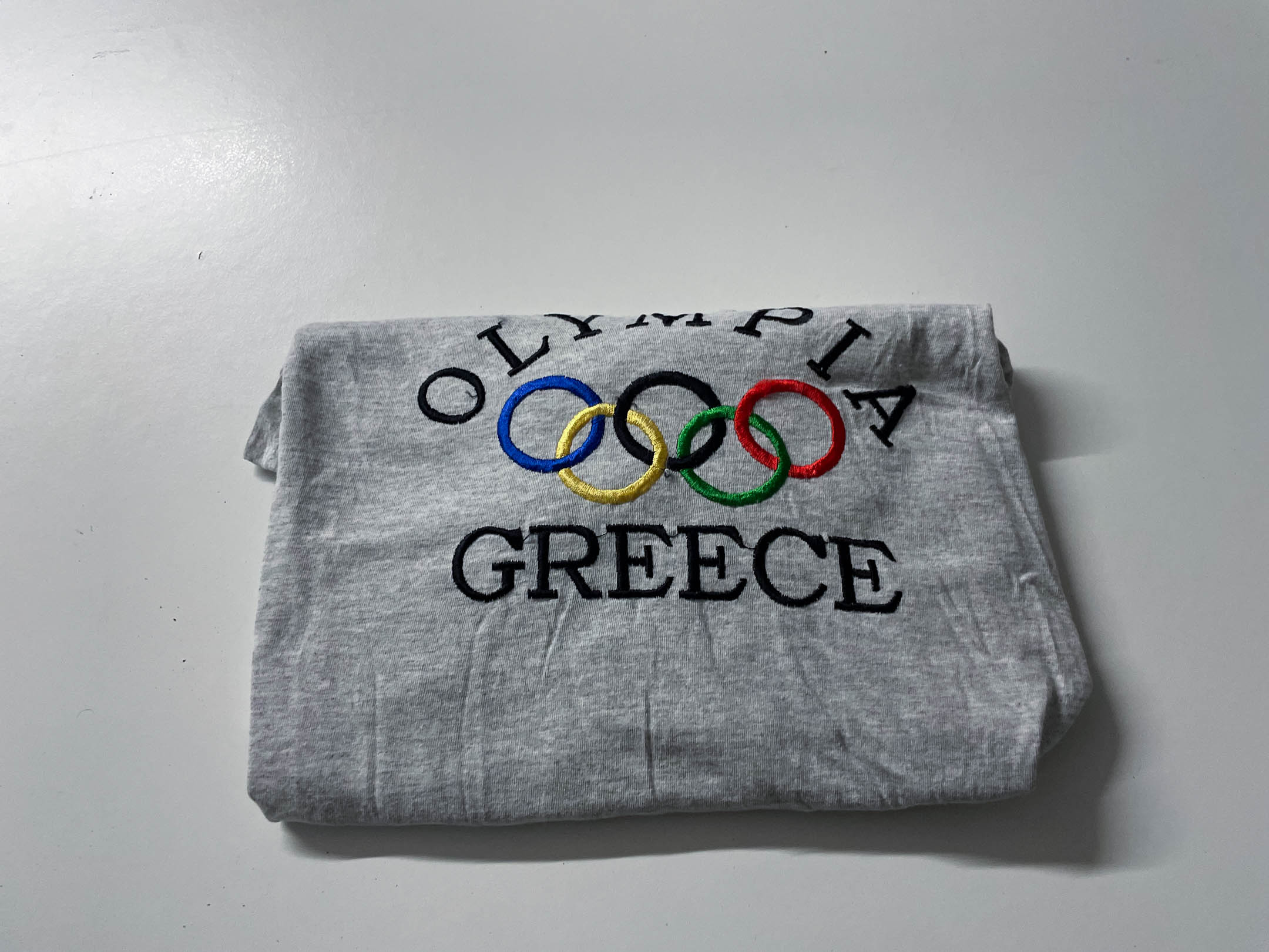 Vintage Men's Grey Fruit of the loom Olympia Greece logo Graphics tees in XL|L28W23|SKU 4054