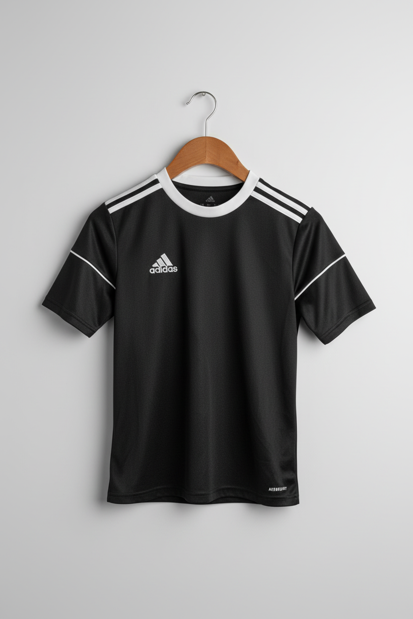 Black Adidas sports jersey with white accents on a hanger against a gray background