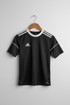 Black Adidas sports jersey with white accents on a hanger against a gray background