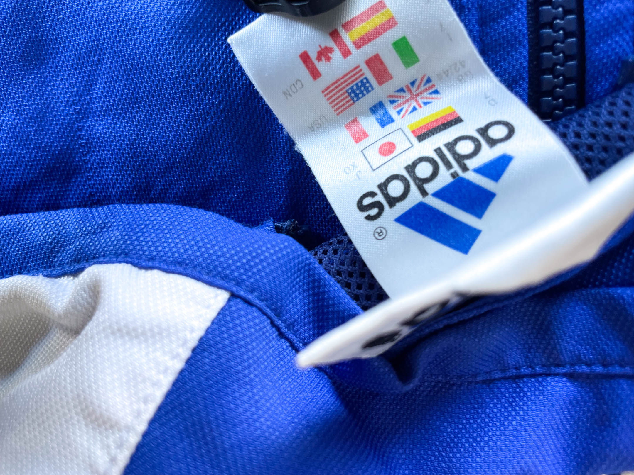 Vintage Adidas Climalite full zip blue windbreaker track top in L\XL| L31 W25|SKU 4383