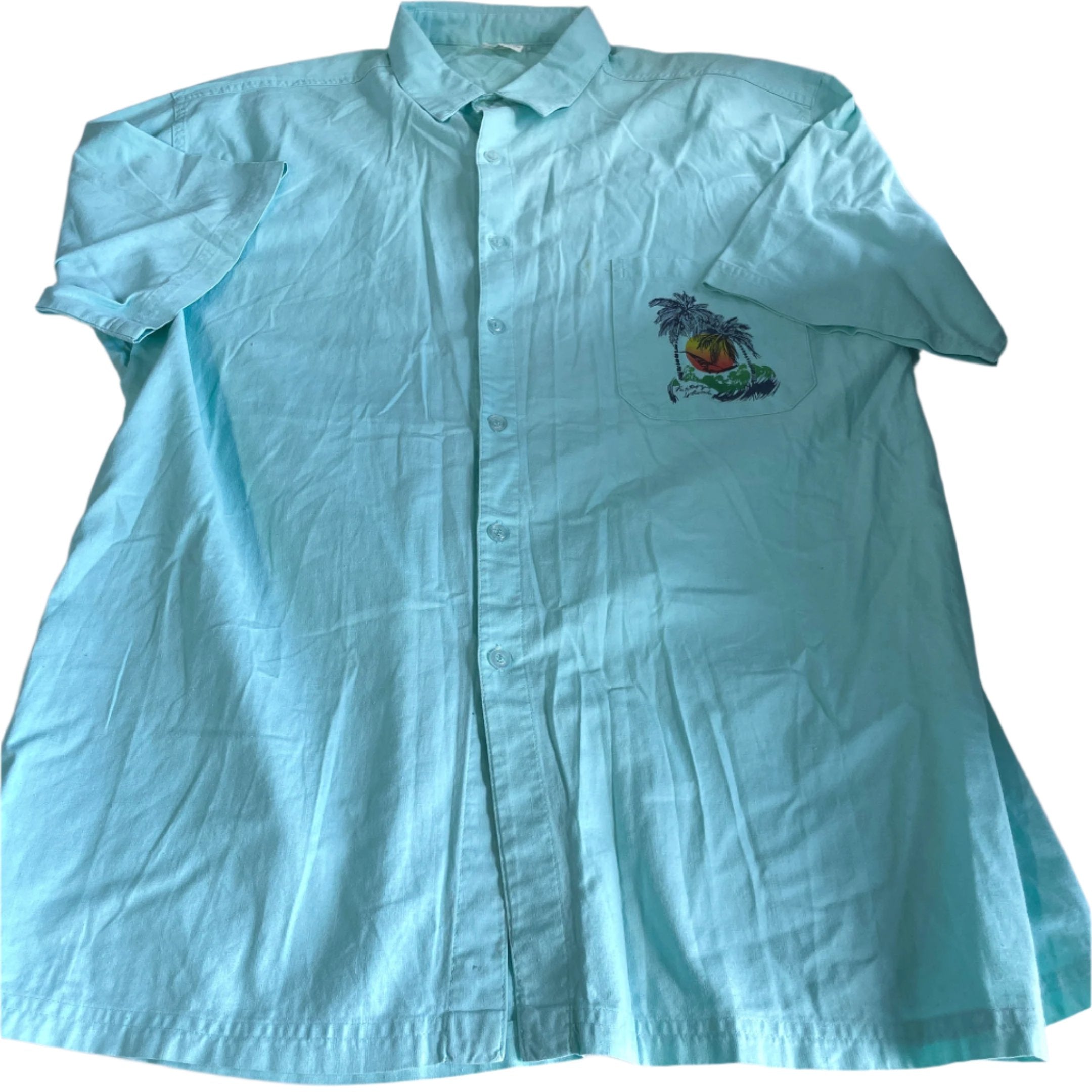 Vintage men 90's  green hawaiin graphics beach short sleeve shirt in L|L31 W20|SKU 6450