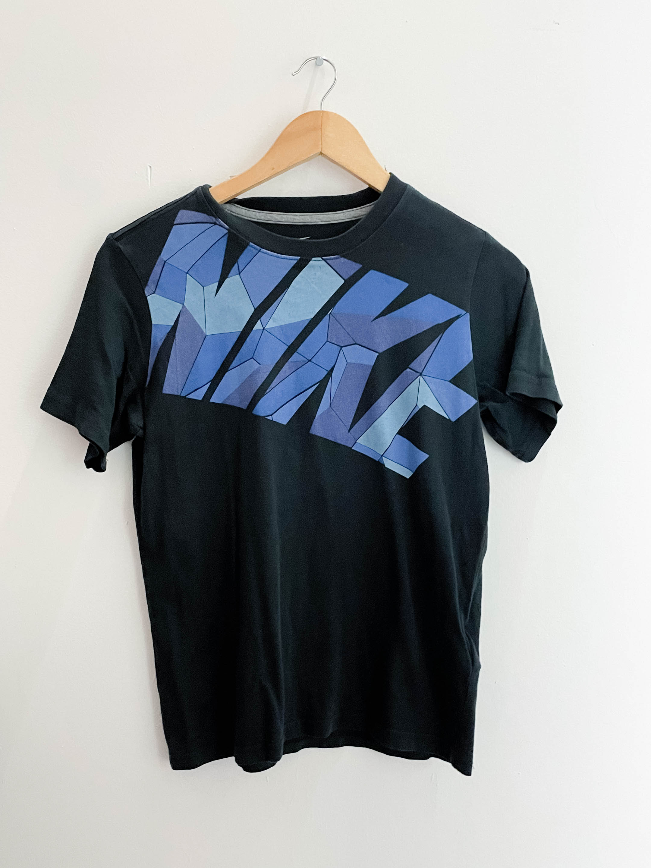 Vintage black nike medium tshirt with nike logo crested in the chest
