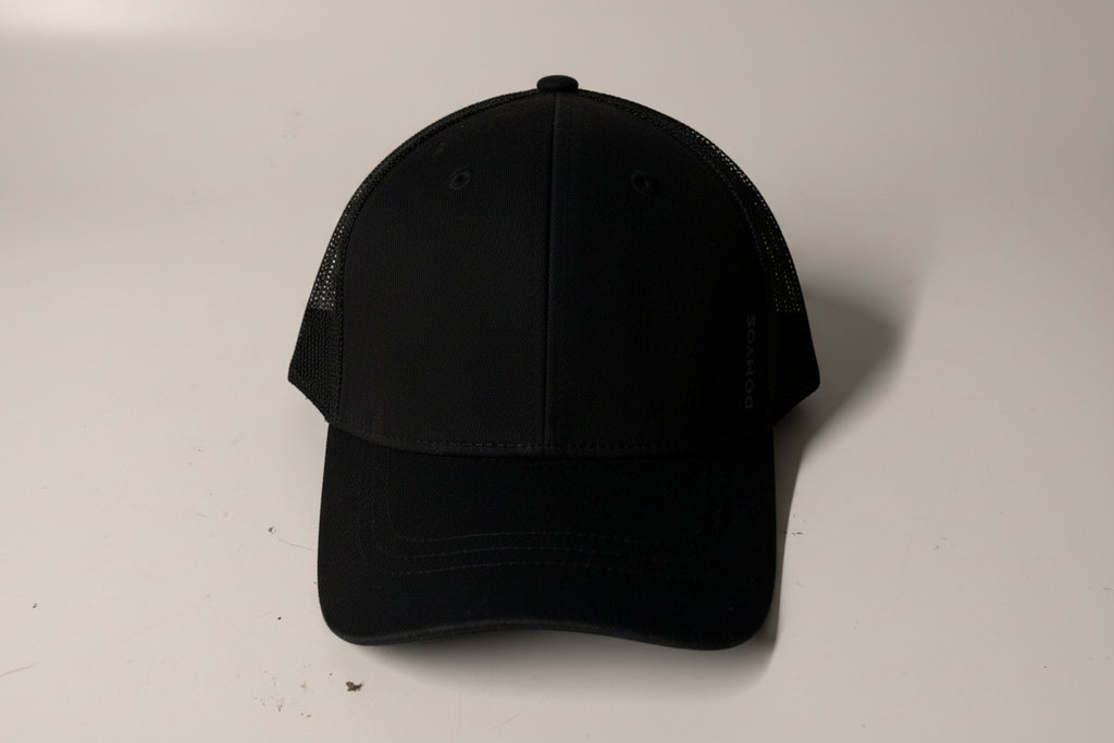 Black cap on a light gray background