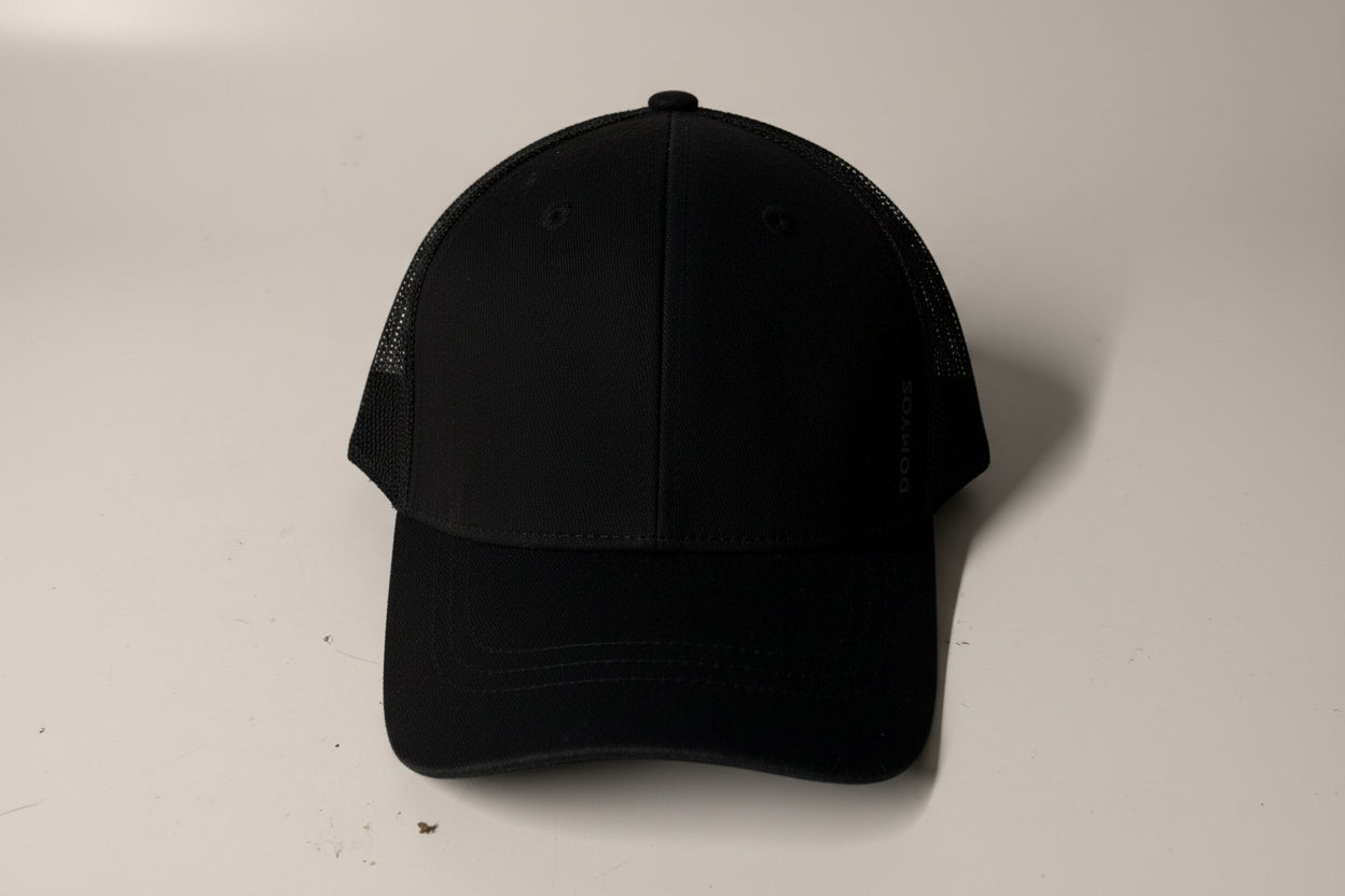 Black cap on a light gray background