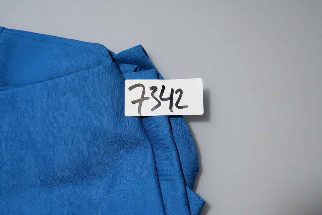  blue short-sleeve Puma t-shirt with a white "WABCO" logo on the front