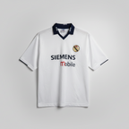 vintage Real Madrid home jersey featuring Luis Figo with the number 10, likely from the 2000-01 or 2001-02 centenary season. SZ L SKU      7443


