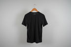 vintage black Adidas training t-shirt. Size L SKU 7345 .SKU 7344 . Price: €15. Material:     The fabric is a lightweight 100%  polyester double-knit, featuring moisture-wicking technology for high-intensity activity. 
