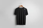 vintage black Adidas training t-shirt. Size L SKU 7345 .SKU 7344 . Price: €15. Material:     The fabric is a lightweight 100%  polyester double-knit, featuring moisture-wicking technology for high-intensity activity. 
