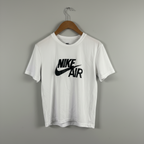 White t-shirt with Nike Air logo on a hanger against a gray background