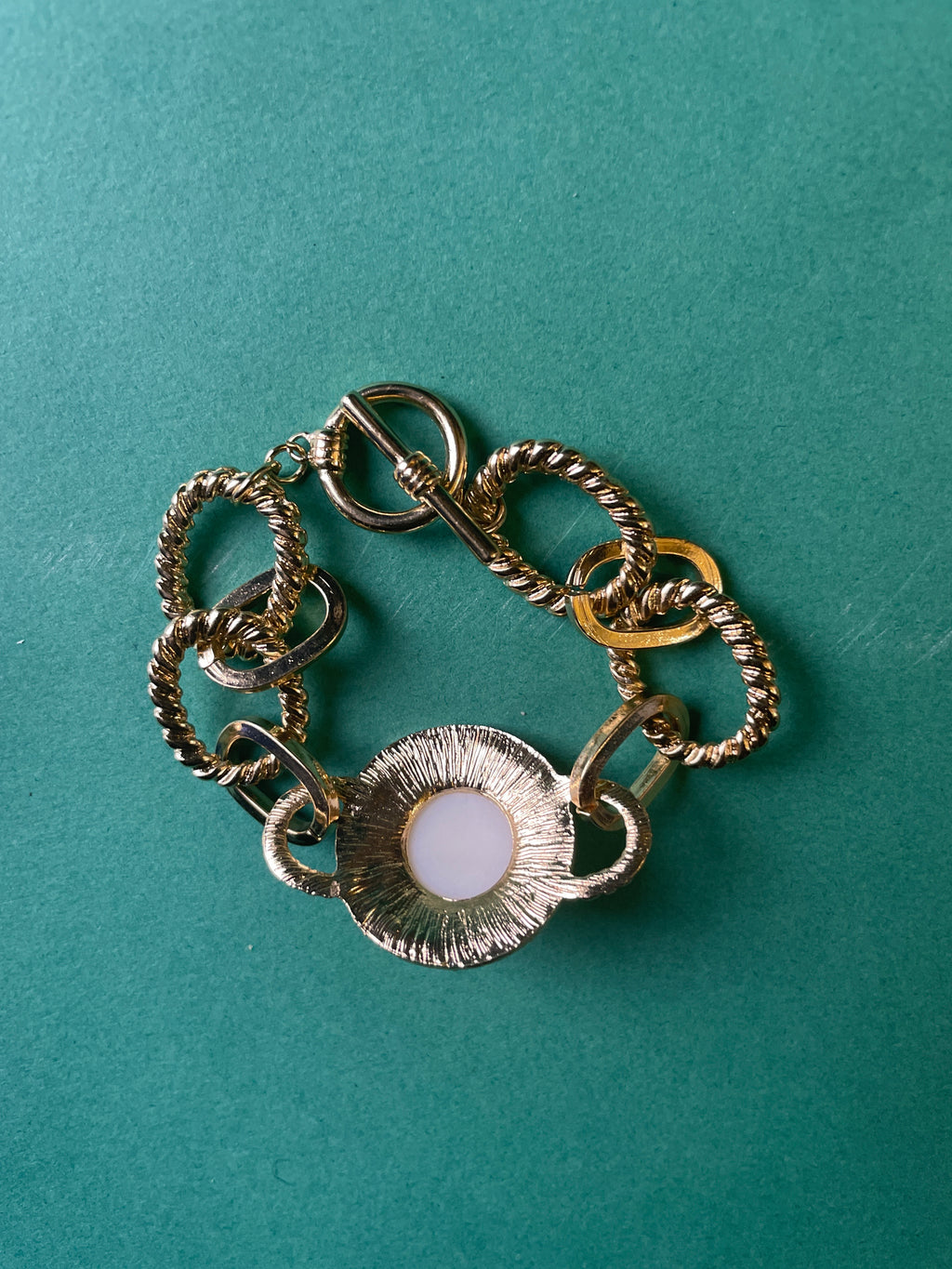 GOAH Gold plated women's hand chain with white ball pendant