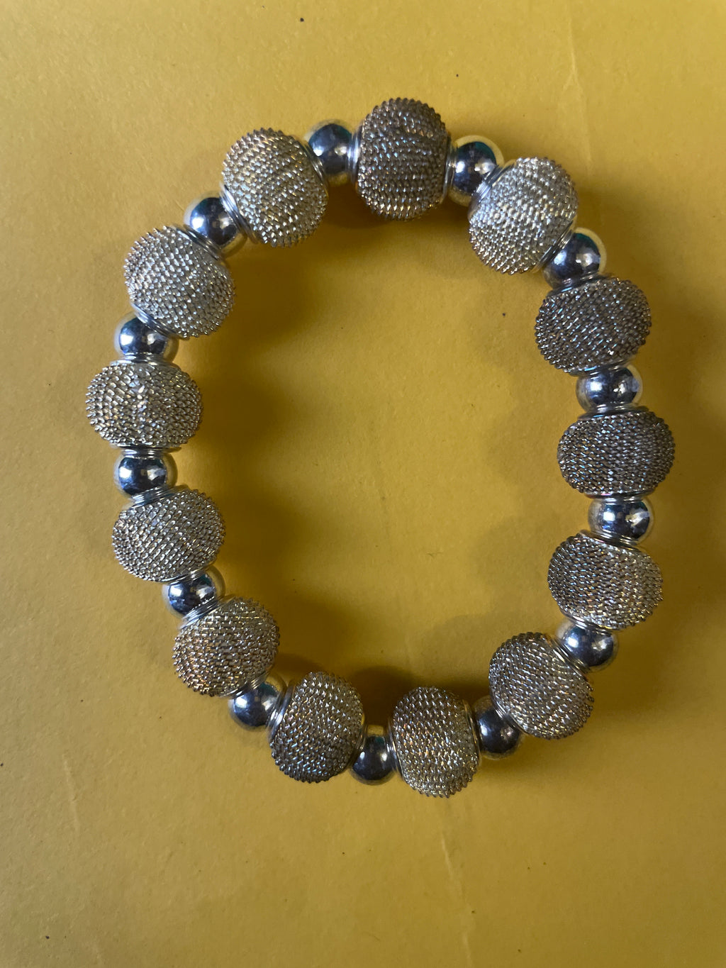 GOAH Cream and silver plated hand bead