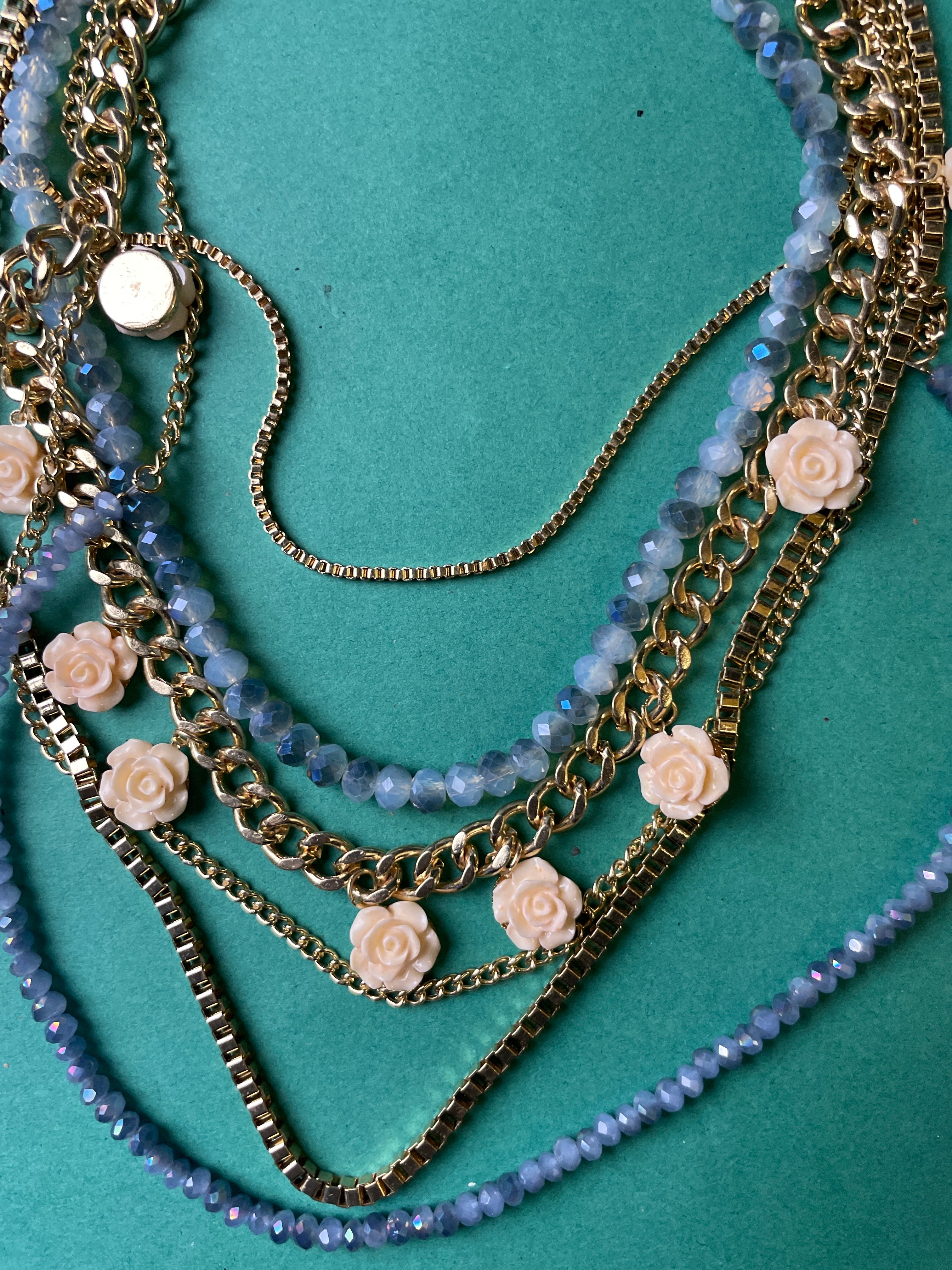 GOAH Gold plated women's necklace with blue bead and creamy flower