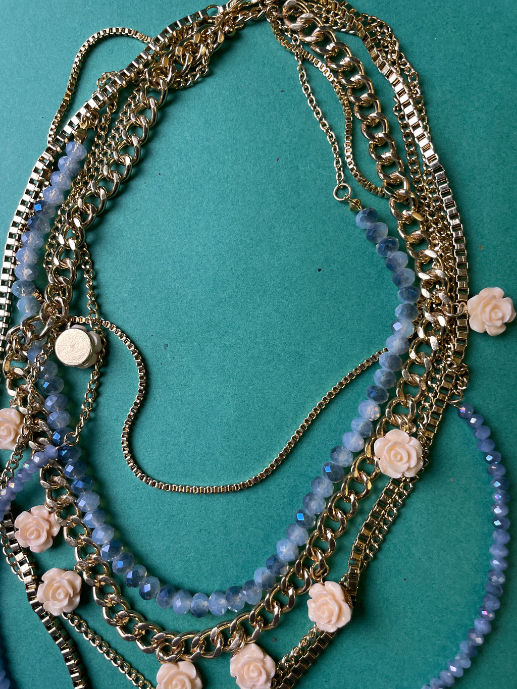 GOAH Gold plated women's necklace with blue bead and creamy flower