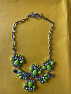 Silver chain women's necklace with flowery crystal and green pendant