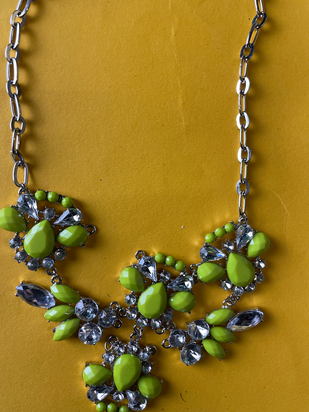 Silver chain women's necklace with flowery crystal and green pendant