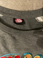 Rubynee Vintage y2k top in grey and white with skull symbol